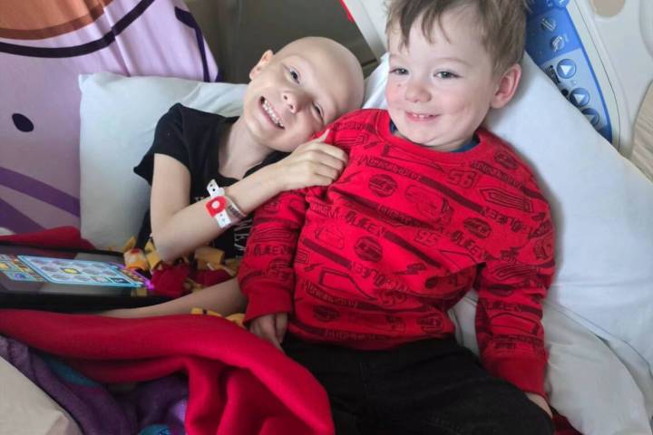 Courtesy of Shannon Smith-Turner Kaylee Grace Petrovich (L) lies next to her 2-year-old brother ...
