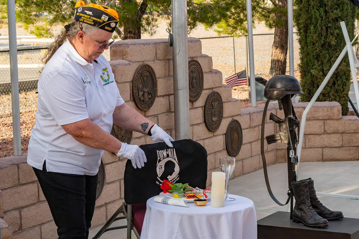 John Clausen/Pahrump Valley Times DAV official Cathy Girard conducted the "Missing Man Table" p ...