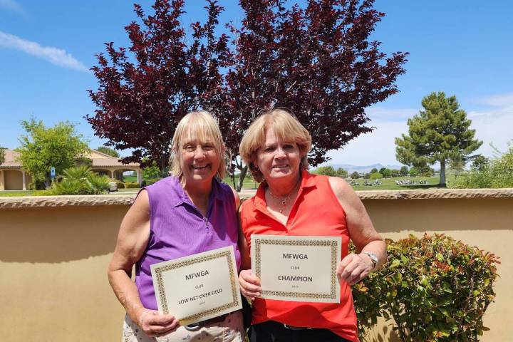 Charity Musial (left) and Jackie Dobbins (right) proudly hold their club championship certifica ...