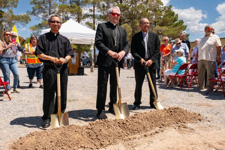 From left to right; Fr. Henry Salditos, the previous pastor of the church, and the one responsi ...