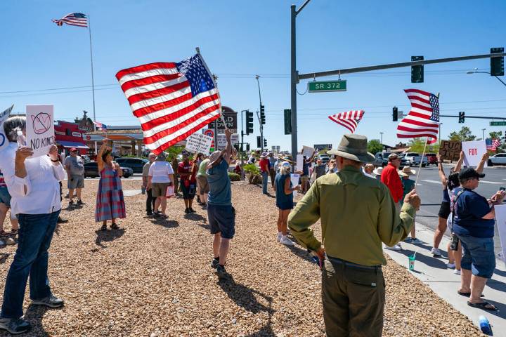 As part of the nationwide No Kings movement, somewhere around 200 people gathered at the northw ...