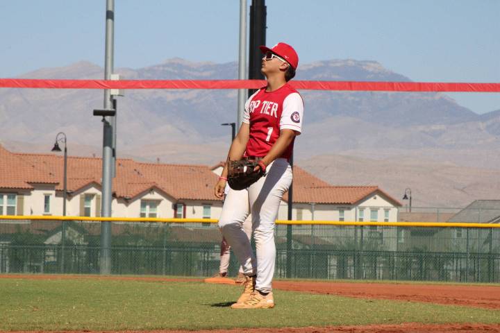 C.J. Nelson throws a ball back in to the pitcher. (Jacob Powers/Pahrump Valley Times)