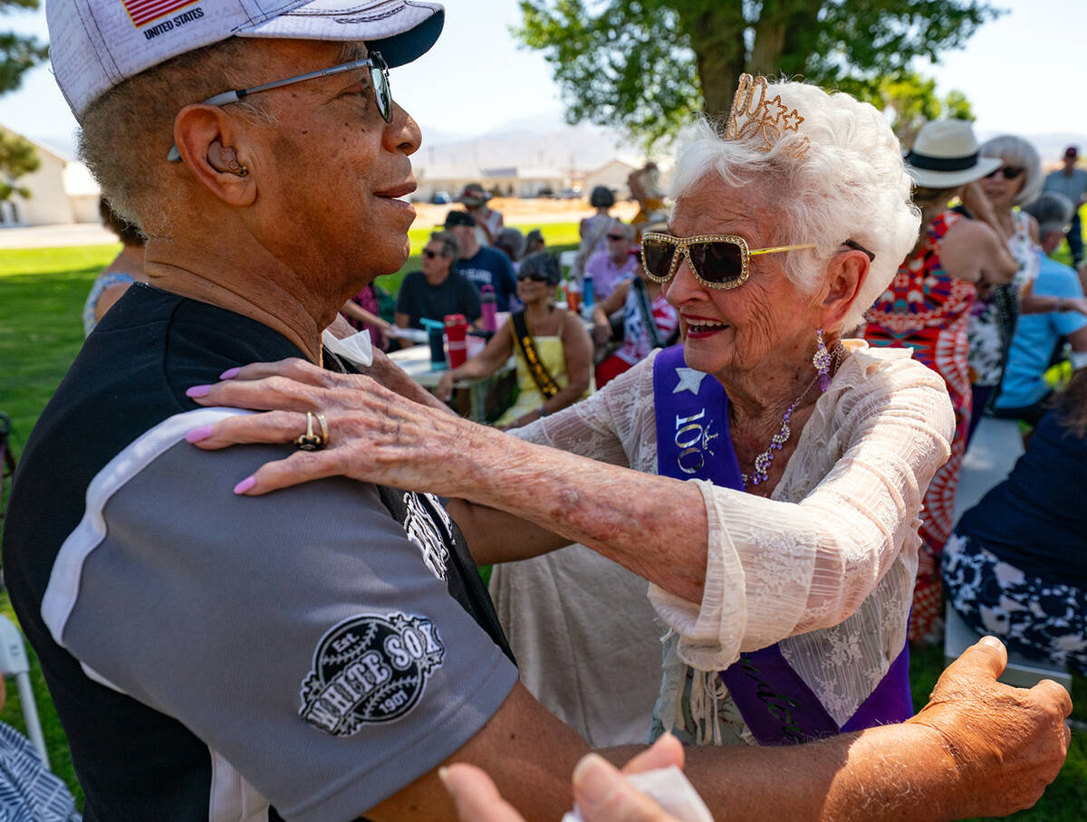 Pahrump resident Dr. Tom Waters embraces B.J. Hetrick-Irwin on Thursday, June 19 in celebration ...
