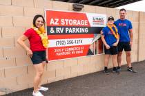 The Sumners, Sylvia (l), son Aiden (r) and Justin (far right) at their ribbon-cutting grand ope ...