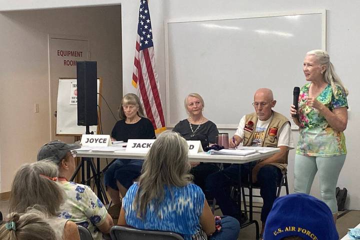 Pahrump Vacant Landowners Group spokesperson Patricia Robb, right, presented "Zombie Lots 101" ...