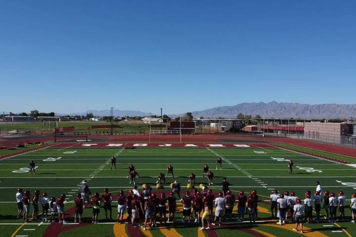 Pahrump Valley High School Trojan football Camp practice began early Monday morning. (James Ack ...