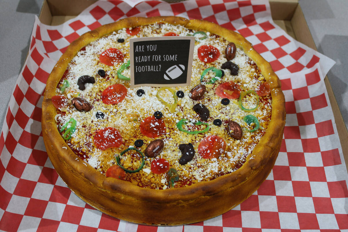 A deep-dish style inspired pizza cake for auction was made by Jan Maher for the Spaghetti Dinne ...