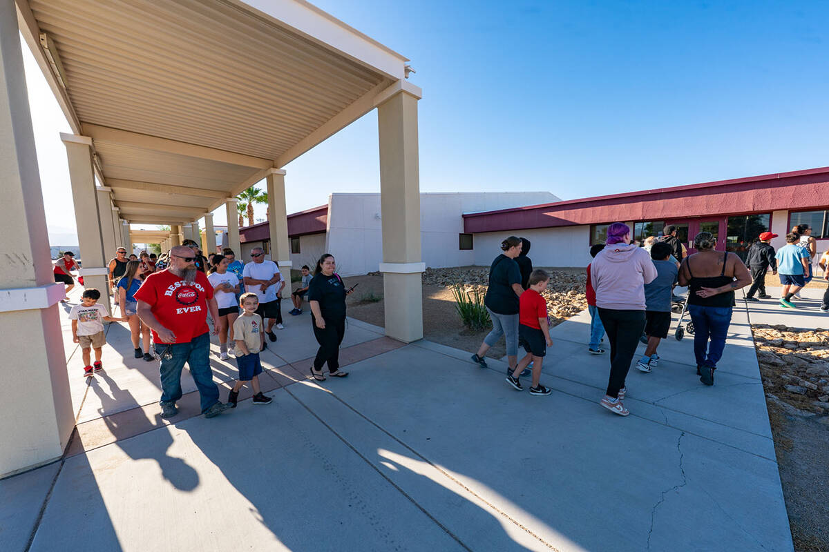 A long line stretched outside the building even before the event started at 8:00 a.m. (John Cla ...