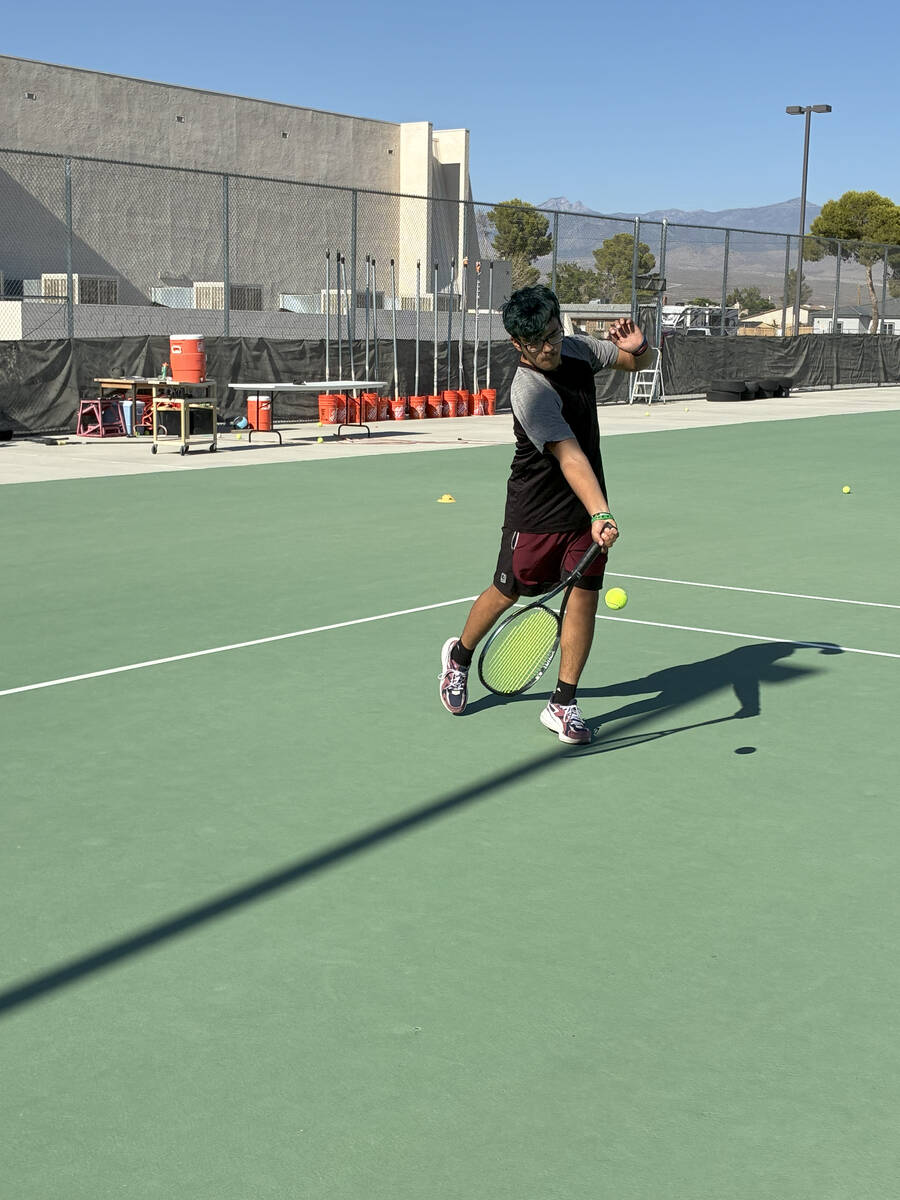 PVHS Tennis Junior Juan Carlos Rodriguez-Ortiz returns a serve. (Michael Dela Rosa/Special to t ...