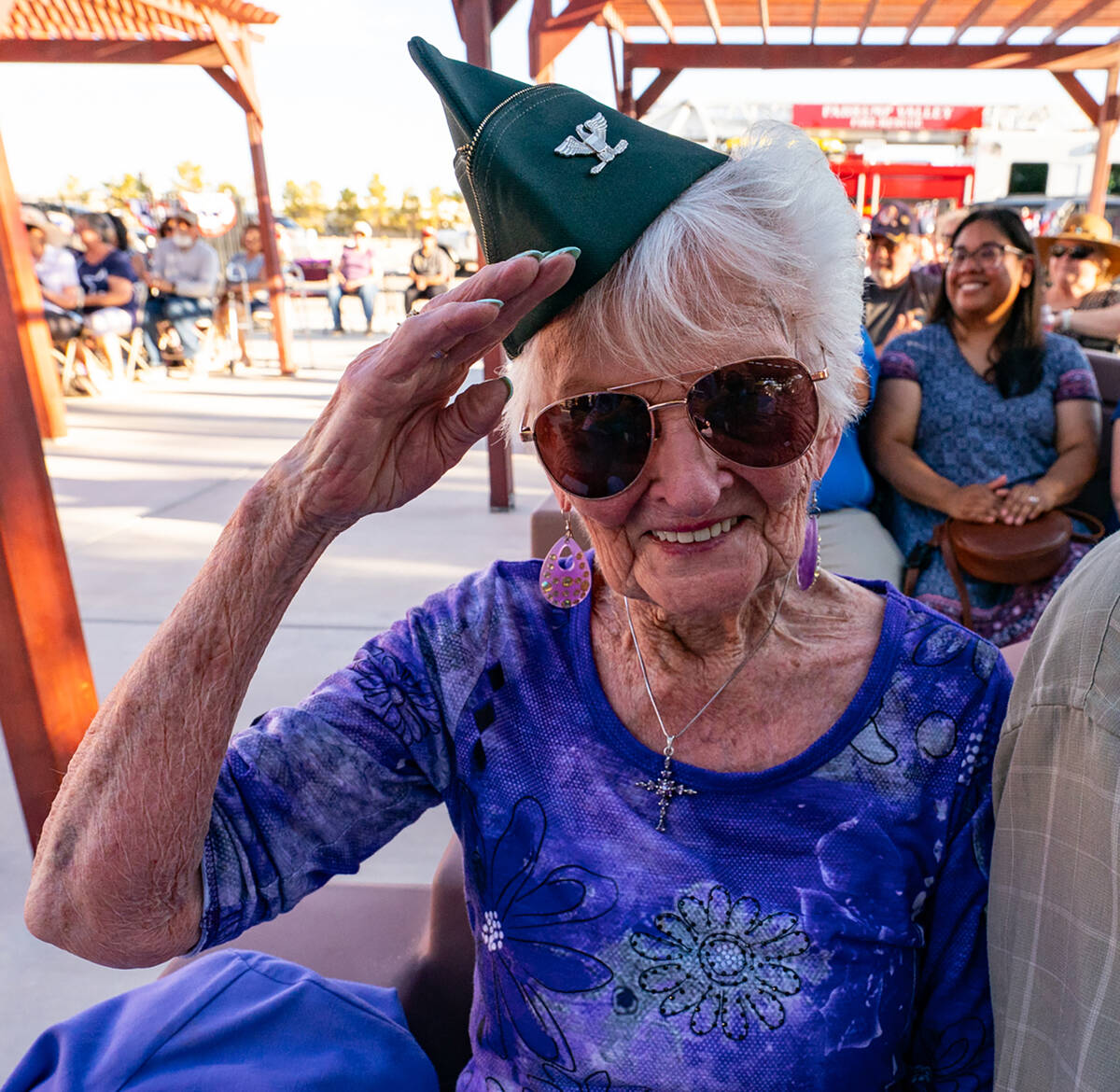 Pahrump resident B.J. Hetrick-Irwin, wearing her new military cap, salutes at the Purple Heart ...