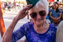 Pahrump resident B.J. Hetrick-Irwin, wearing her new military cap, salutes at the Purple Heart ...