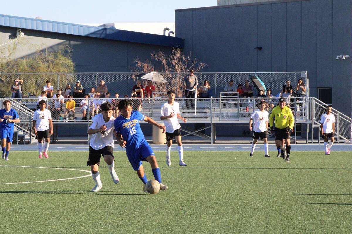Pahrump Valley High School boys soccer sophomore defender Azael-Machuca-Castillo goes to attack ...