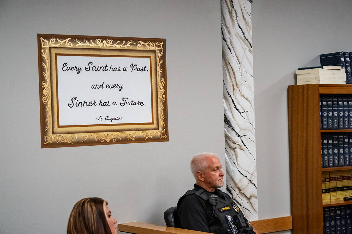 This painted quote on the wall, attributed to Saint Augustine, looks over court room B at the P ...