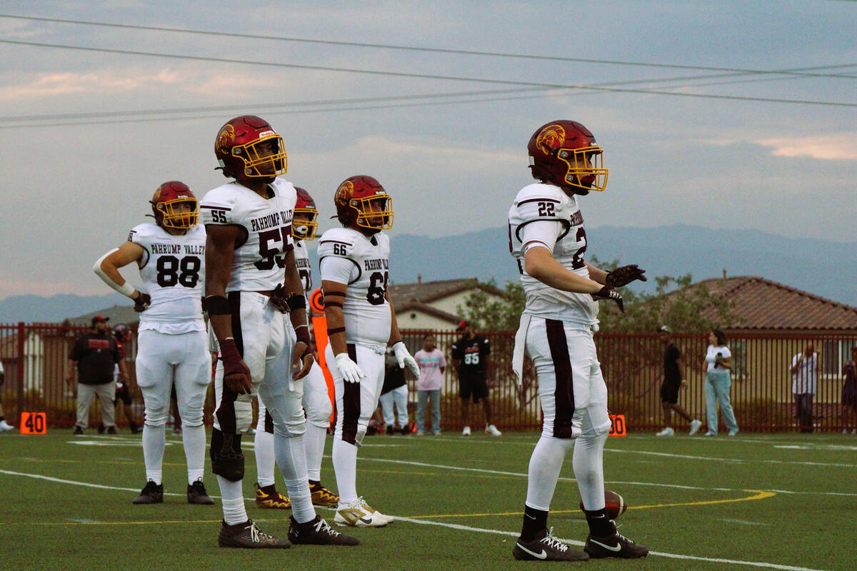 The Trojans defense prepares to get set on the line as they held the Cougars scoreless and forc ...