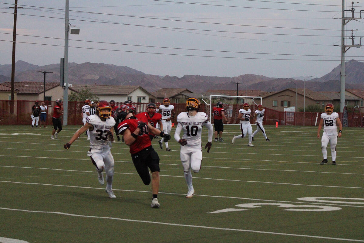 Trojans junior Lucas Gavenda and Austin Alvarez helped to keep the Cougars scoreless in a 54-0 ...