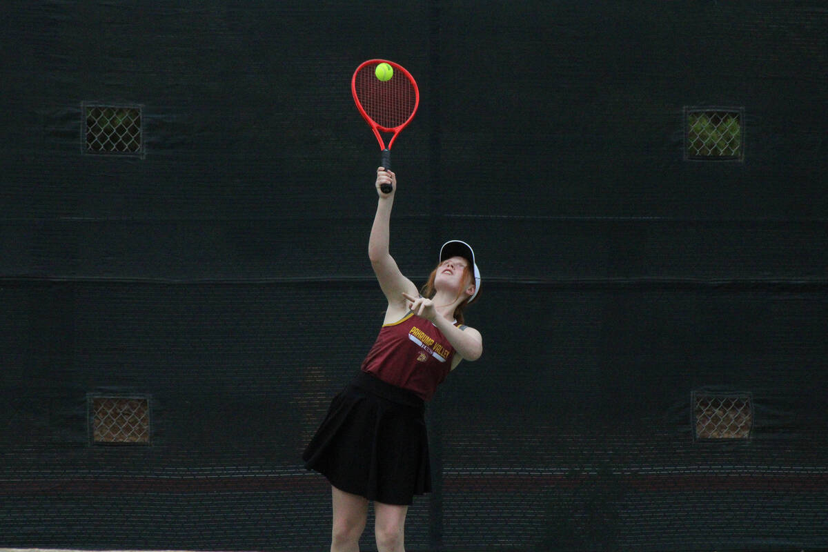 Pahrump Valley High School tennis sophomore Nyomi Skinner prepares to serve to her opponent in ...