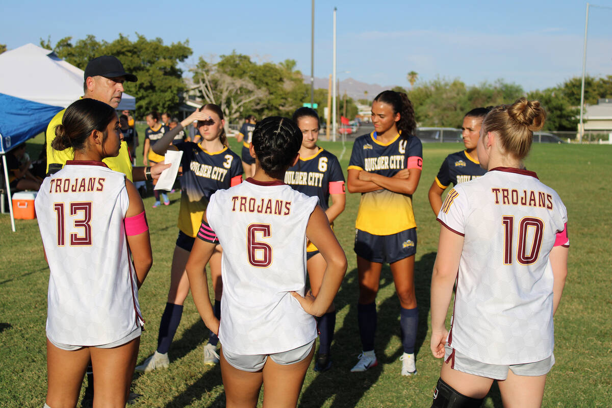 Trojans team co-captains junior Natalie Soto, Natalia Vallin and Aubrey Williams meet Boulder C ...