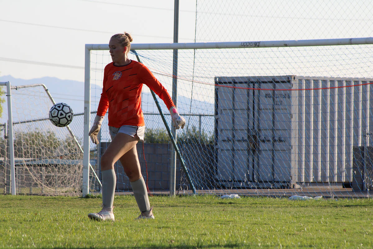 Pahrump Valley High School girls soccer goalkeeper senior Julieanne Briggs prepares to send a b ...