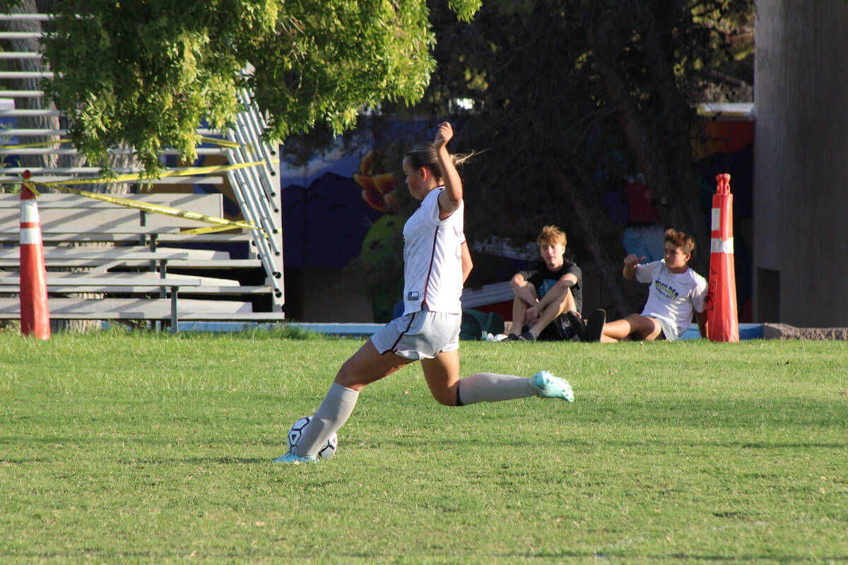 Pahrump Valley High School girls soccer sophomore Cindal Monahan sends a free kick flying again ...