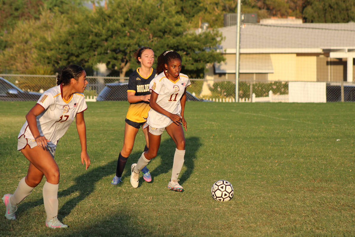 Pahrump Valley High School girls soccer senior Diona Nixon keeps control of the ball in a leagu ...