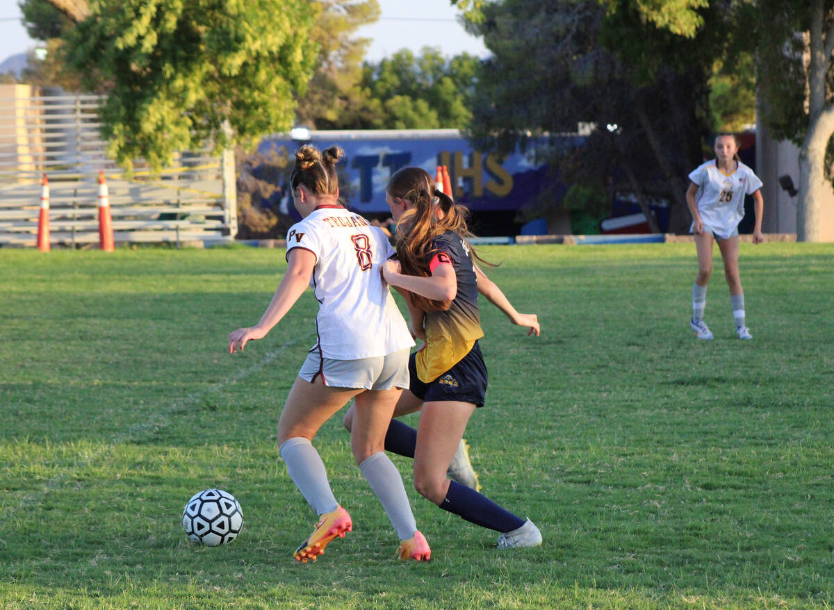 Pahrump Valley High School girls soccer junior Sydney Crotty advances the ball up field in a le ...