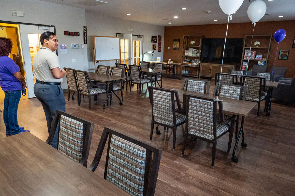 The movie room has been renovated completely with new furniture and newly painted walls. (John ...