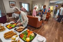 Guests and residents enjoyed finger food during Inspirations Senior Living’s two-hour celebra ...