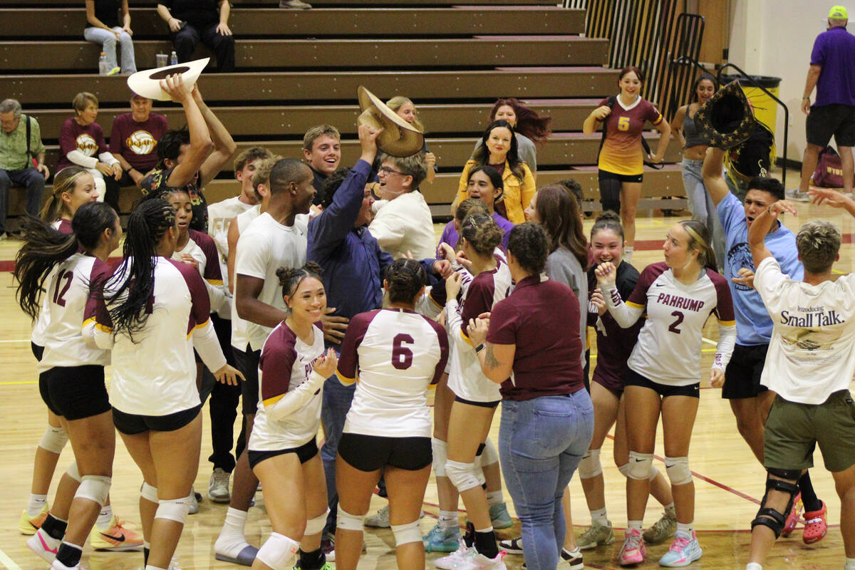 Upon winning the fifth tie-breaker set 15-10, the Trojans home fans stormed the court to celebr ...