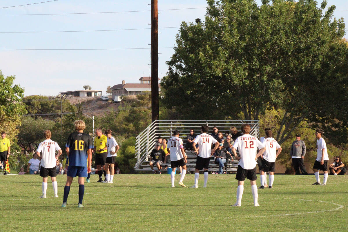 After defeating rivals Boulder City High School, the Trojans varsity soccer team improved their ...