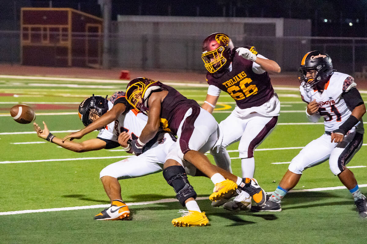 The Trojans defense held the Cowboys to only 14 points in their first home game of the year. (J ...