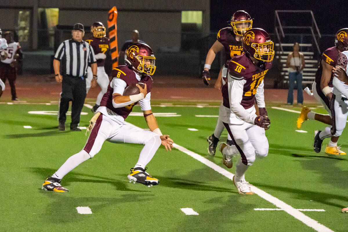 Pahrump Valley High School senior quarterback Kayne Horibe rushed for 173 yards and three touch ...