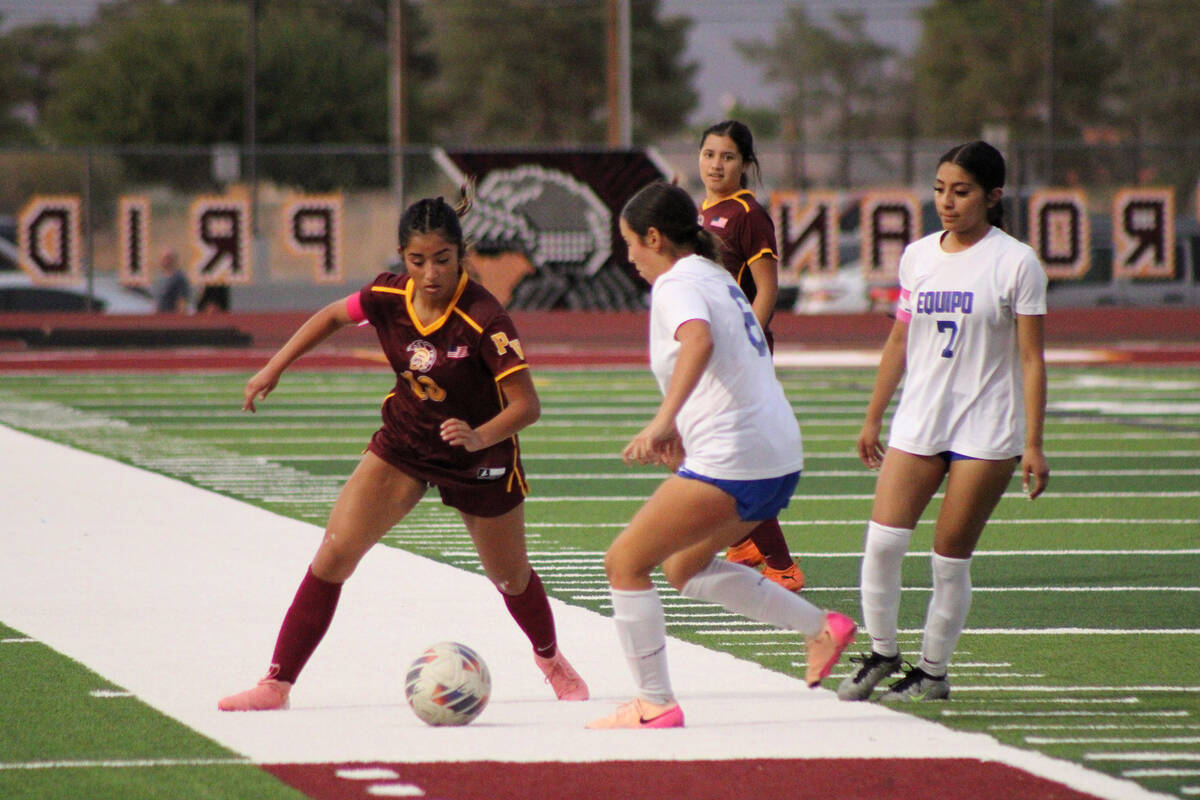 Pahrump Valley High School junior co-captain Natalie Soto makes a move on the ball before getti ...