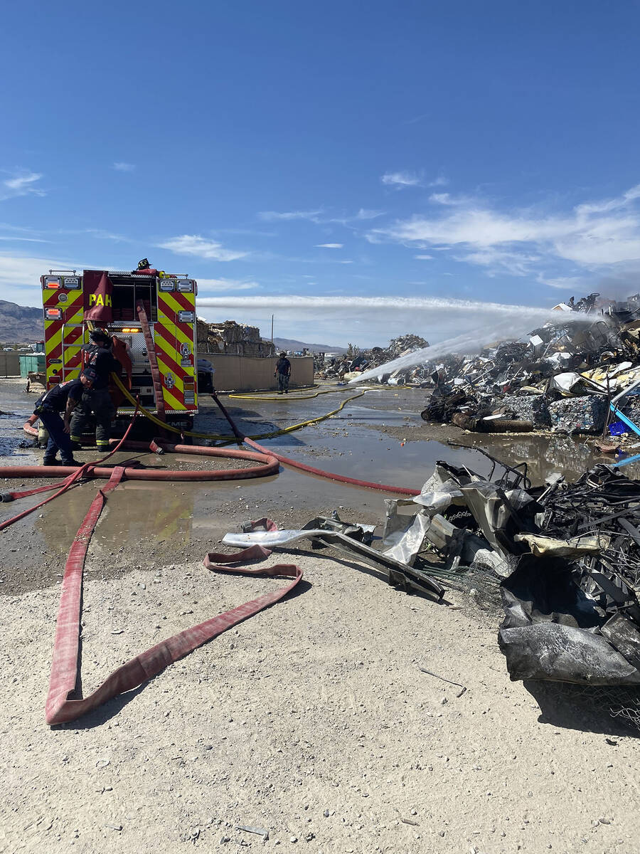 Crews found a section of a rubbish pile on fire in a recycling facility. The large mound was ov ...