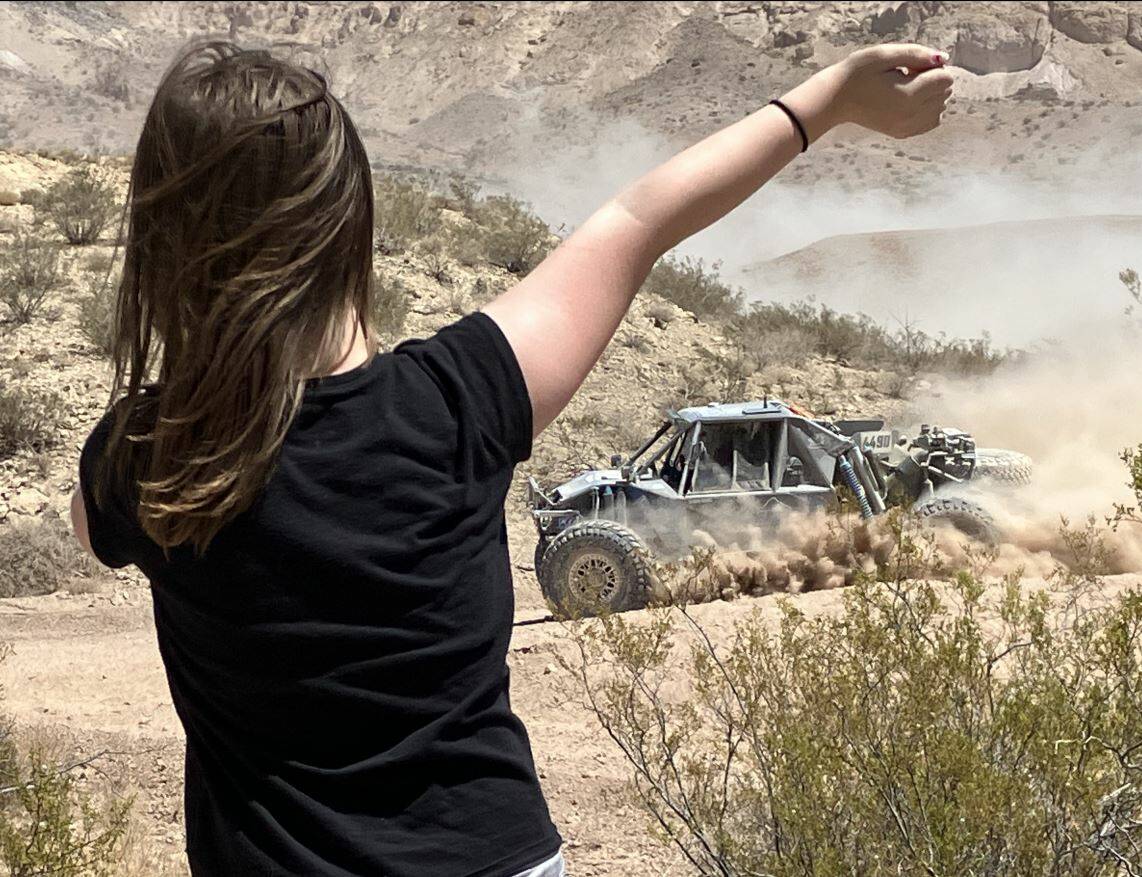 A young race participant watches on as one of the OHV vehicles zips by during the Vegas to Reno ...