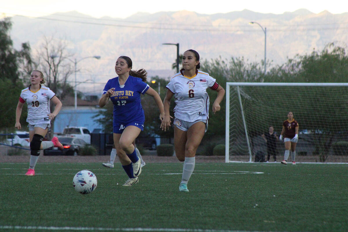 Pahrump Valley High School senior captain Natalia Vallin tries to maintain control of the ball ...