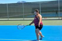 Pahrump Valley High School tennis athlete Melinda Rivera prepares to return a serve in a road l ...