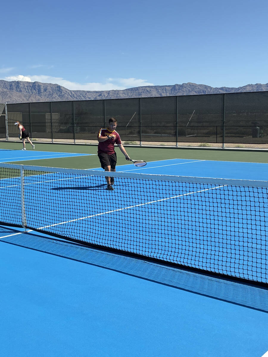 Pahrump Valley High School tennis freshman Chase Hansen put up a hard-fought match against Virg ...