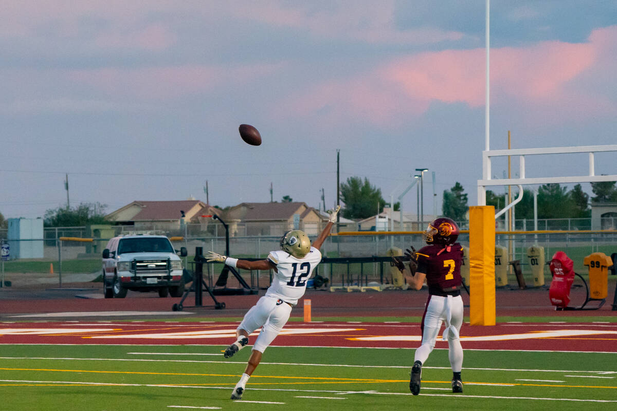 Pahrump Valley High School junior wideout Ryan Hamlin attempts to reel in a deep pass against S ...
