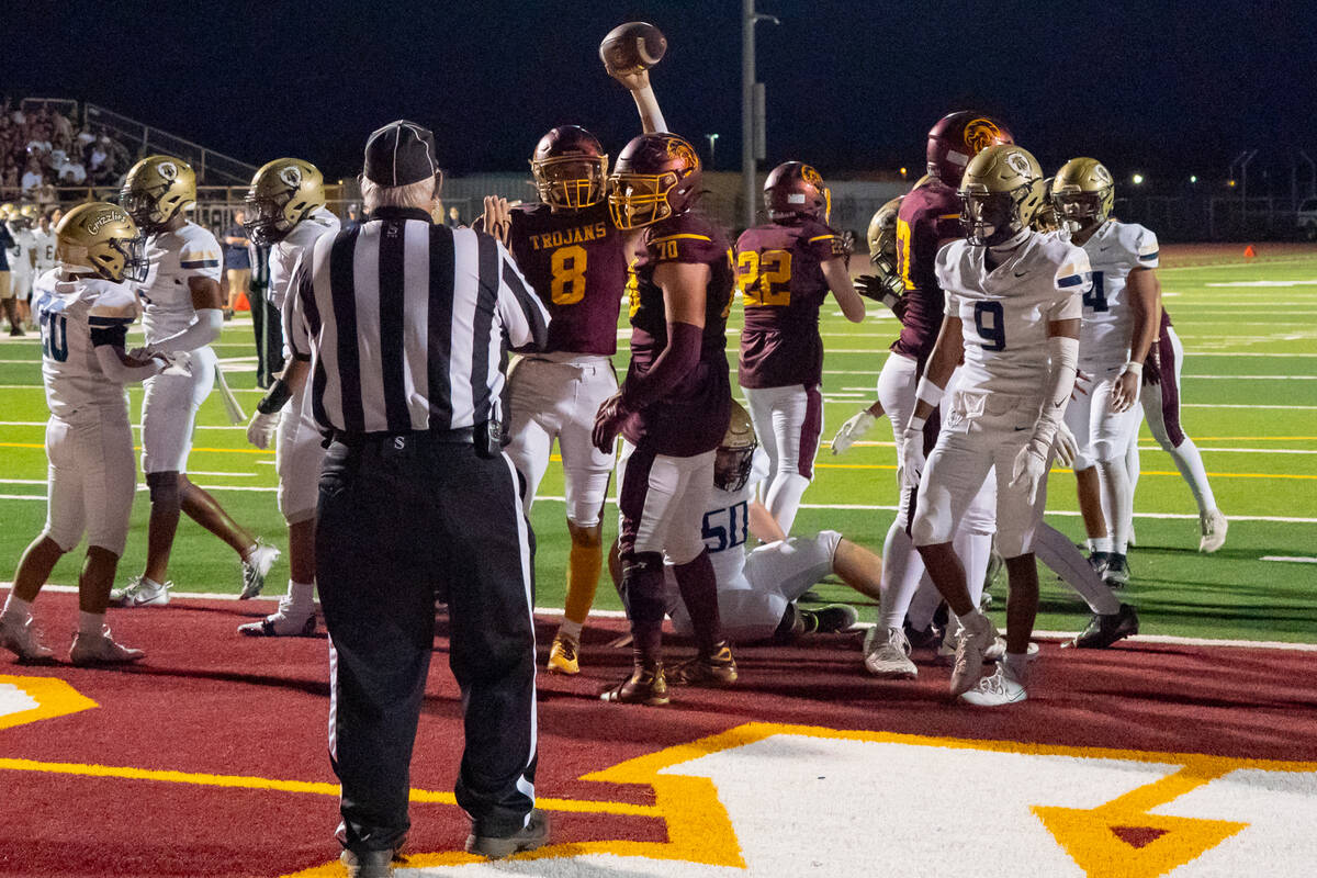 Pahrump Valley High School senior QB Kayne Horibe celebrates following a 3-yard rushing touchdo ...