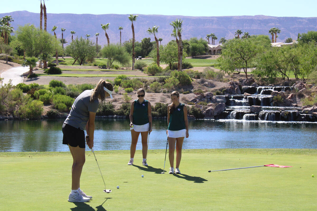 Pahrump Valley High School girls golf freshman Raegan Saldana finishes a nice putt on hole 6 of ...