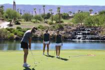 Pahrump Valley High School girls golf freshman Raegan Saldana finishes a nice putt on hole 6 of ...