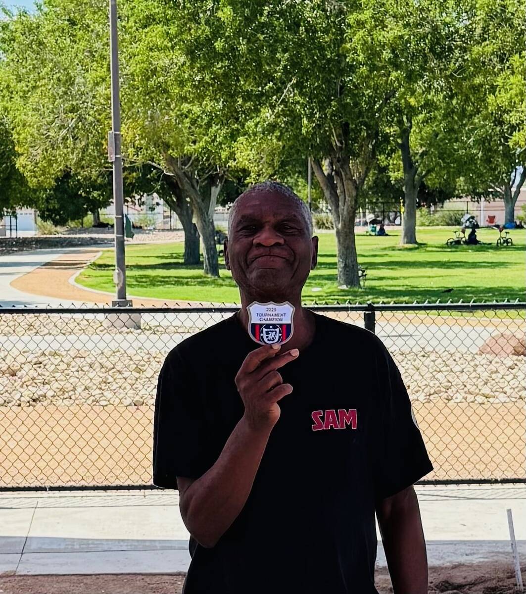 Nevada State Horseshoe Pitching Association pitcher Sam Godbouldt proudly displays his first pl ...