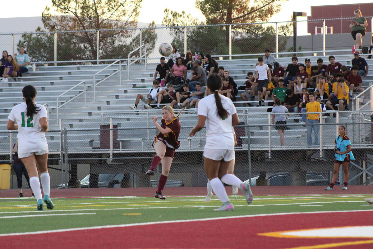 Pahrump Valley High School girls soccer freshman Kimberly Villalobos connects with the ball in ...