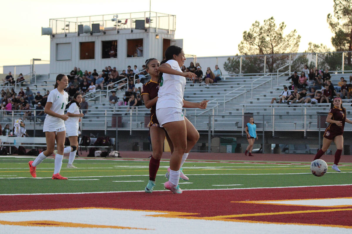 Pahrump Valley High School girls soccer senior captain Natalia Vallin gets physical in the box ...