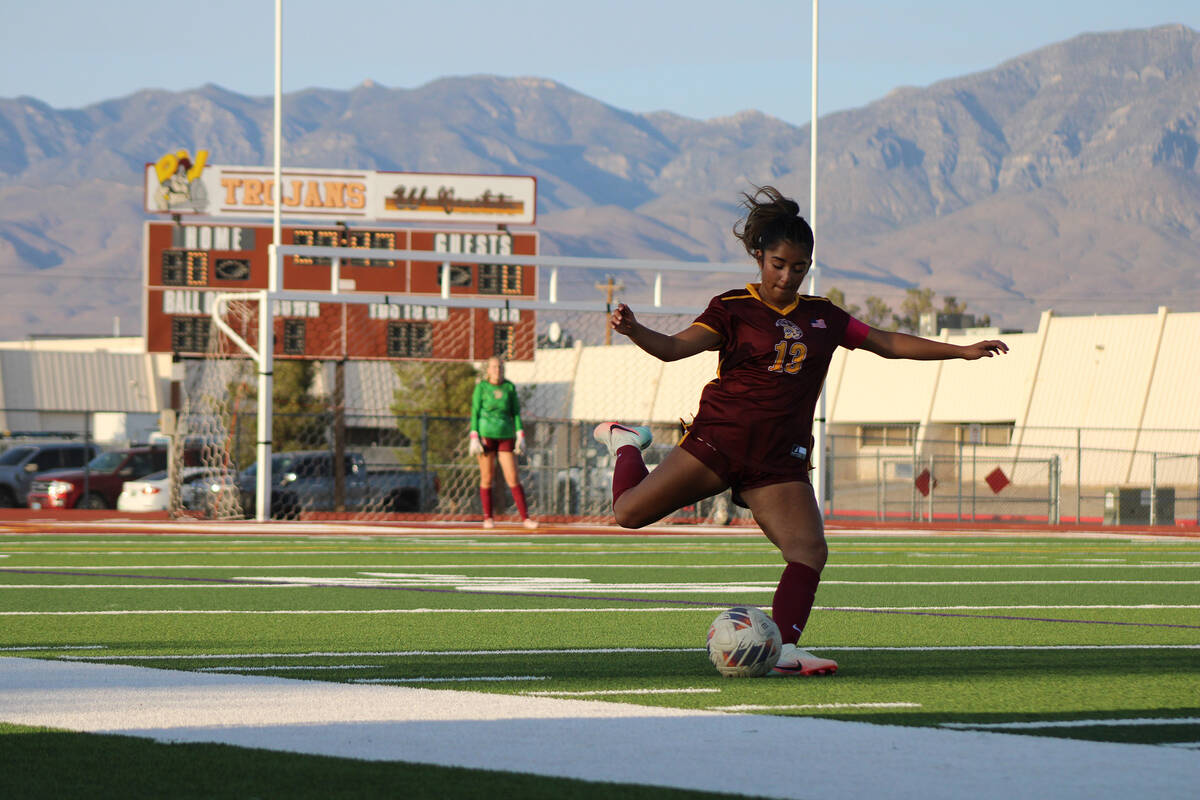 Pahrump Valley High School girls soccer junior co-captain Natalie Soto lets one fly on a free k ...