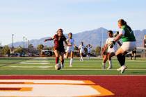 Pahrump Valley High School girls soccer junior Juliana Shepard-Lopez advances the ball near the ...