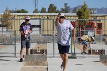 Nevada State Horseshoe Pitching Association president Lathan (Rebel) Dilger goes for a ringer i ...