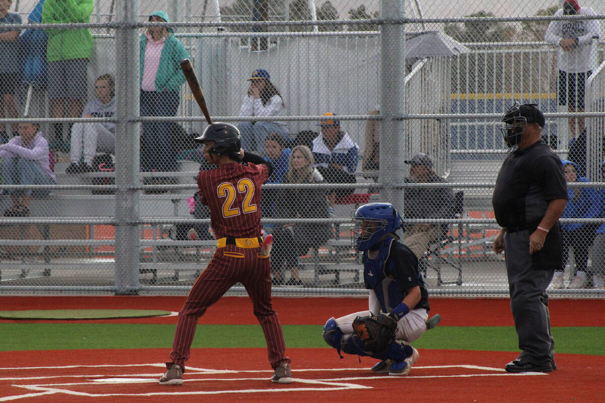 Pahrump Valley High School class of 2027 shortstop Tony Whitney battles the rain during an away ...
