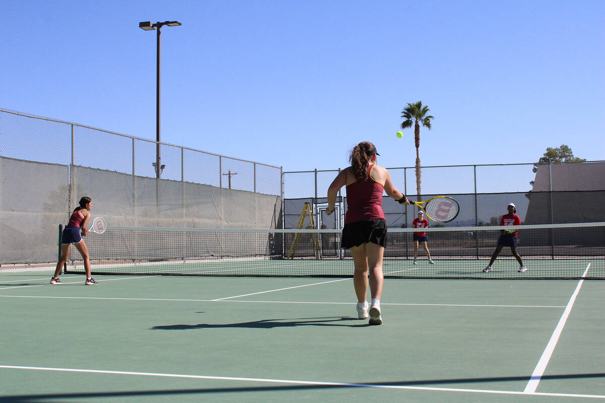 Pahrump Valley High School tennis doubles duo Sarah Miller (left) and Lily Gregory (right) scri ...