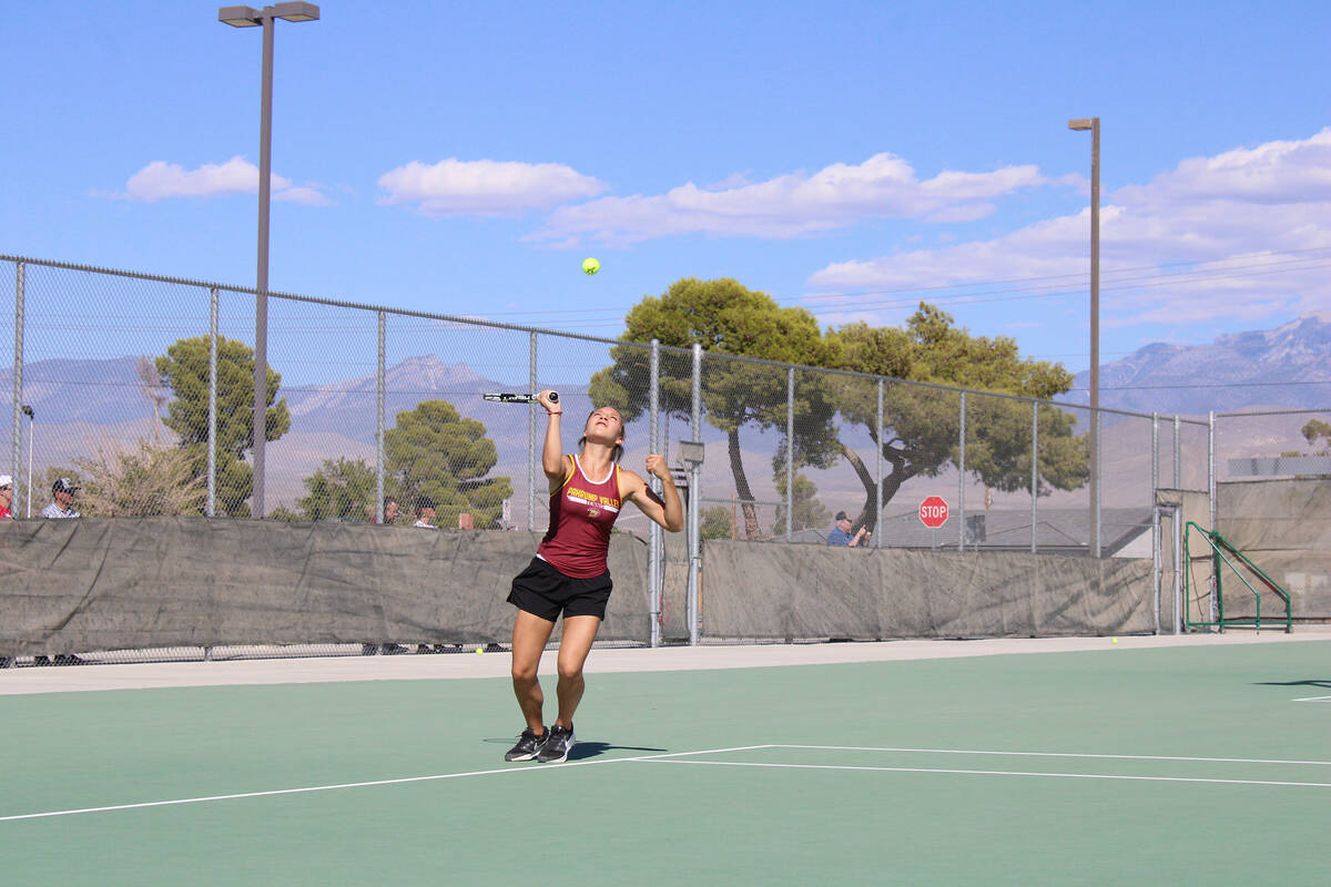 Pahrump Valley High School tennis junior Layla Burnell prepares to serve in a home league match ...